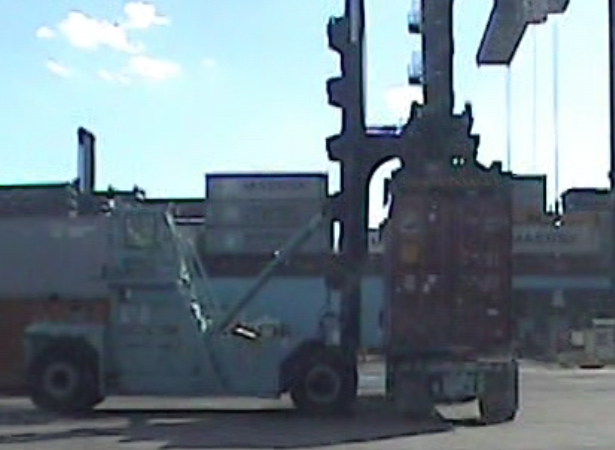 Top Loader Placing a Container on a Semi-trailer